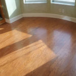 A well lit wooden floor with the sunlight